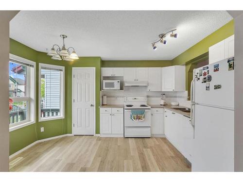 301 Tarington Close Ne, Calgary, AB - Indoor Photo Showing Kitchen With Double Sink