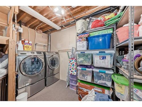 144 Riverglen Drive Se, Calgary, AB - Indoor Photo Showing Laundry Room