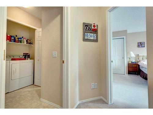 127 Sienna Park Green Sw, Calgary, AB - Indoor Photo Showing Laundry Room