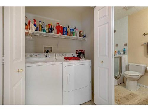 127 Sienna Park Green Sw, Calgary, AB - Indoor Photo Showing Laundry Room