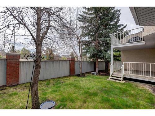 127 Sienna Park Green Sw, Calgary, AB - Outdoor With Backyard