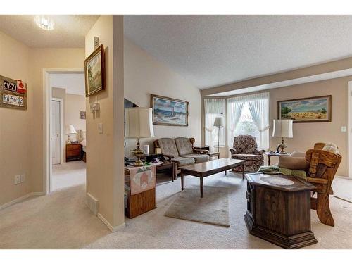 127 Sienna Park Green Sw, Calgary, AB - Indoor Photo Showing Living Room