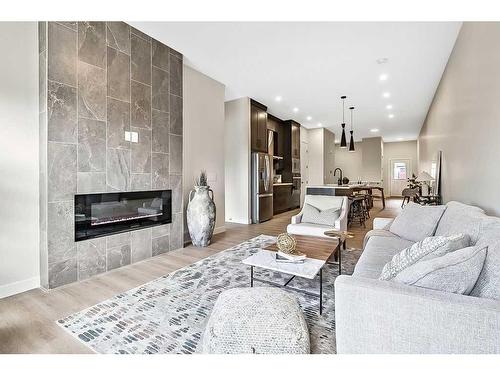 5 Wolf Crescent, Okotoks, AB - Indoor Photo Showing Living Room With Fireplace