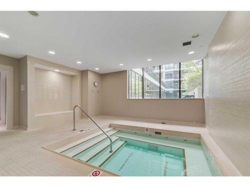 1007-128 2 Street Sw, Calgary, AB - Indoor Photo Showing Other Room With In Ground Pool