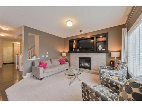 137 Kincora Glen Rise Nw, Calgary, AB - Indoor Photo Showing Living Room With Fireplace