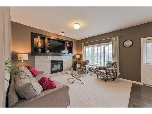137 Kincora Glen Rise Nw, Calgary, AB - Indoor Photo Showing Living Room With Fireplace