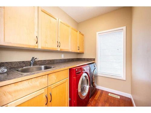 219 Panamount Circle Nw, Calgary, AB - Indoor Photo Showing Laundry Room