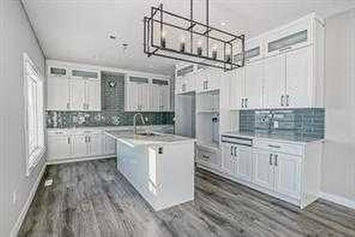 1409 Price Close, Carstairs, AB - Indoor Photo Showing Kitchen With Upgraded Kitchen