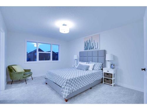 1125 Bayview Gardens Sw, Airdrie, AB - Indoor Photo Showing Bedroom