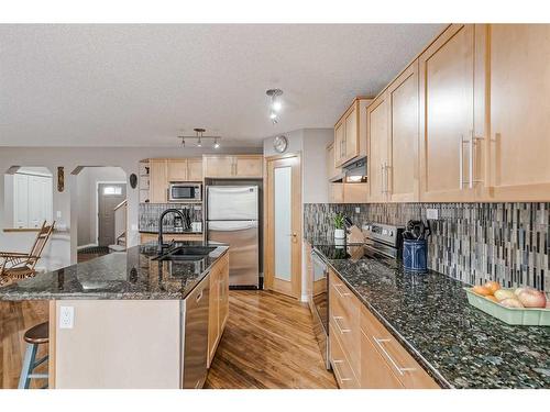 687 Tuscany Drive Nw, Calgary, AB - Indoor Photo Showing Kitchen With Upgraded Kitchen