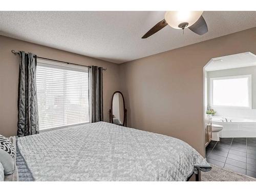 687 Tuscany Drive Nw, Calgary, AB - Indoor Photo Showing Bedroom