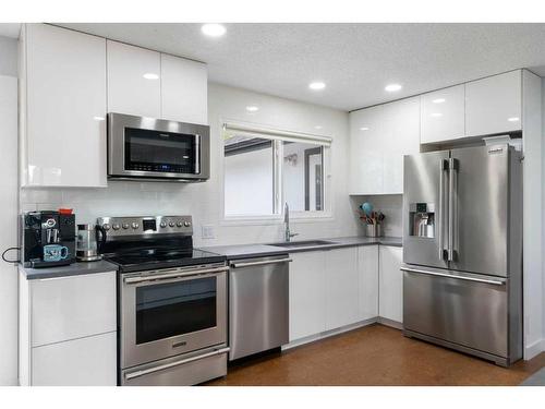 7127 20 Street Se, Calgary, AB - Indoor Photo Showing Kitchen With Stainless Steel Kitchen