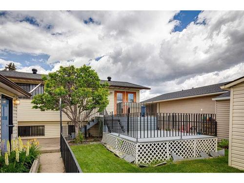 24 Radcliffe Bay Se, Calgary, AB - Outdoor With Deck Patio Veranda With Exterior