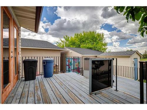 24 Radcliffe Bay Se, Calgary, AB - Outdoor With Deck Patio Veranda With Exterior