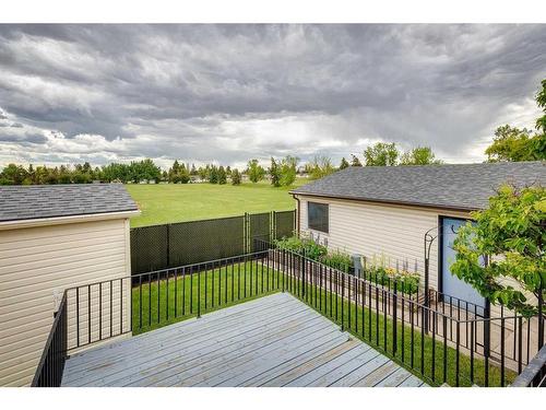 24 Radcliffe Bay Se, Calgary, AB - Outdoor With Deck Patio Veranda