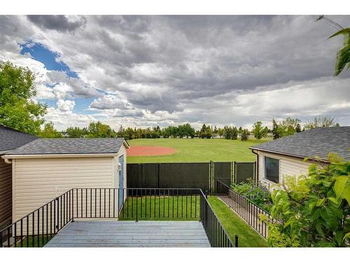 24 Radcliffe Bay Se, Calgary, AB - Outdoor With Deck Patio Veranda