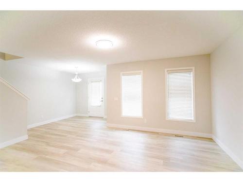 104 Windstone Link Sw, Airdrie, AB - Indoor Photo Showing Other Room