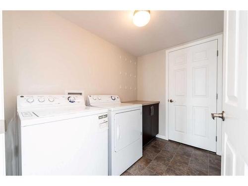 104 Windstone Link Sw, Airdrie, AB - Indoor Photo Showing Laundry Room