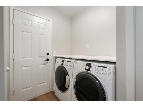 113 Somerset Drive Sw, Calgary, AB - Indoor Photo Showing Laundry Room