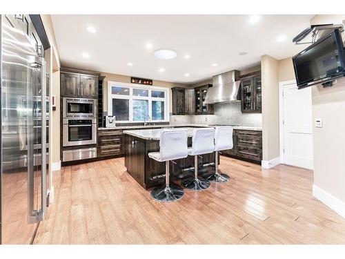 100-8014 338 Avenue East, Rural Foothills County, AB - Indoor Photo Showing Kitchen With Upgraded Kitchen