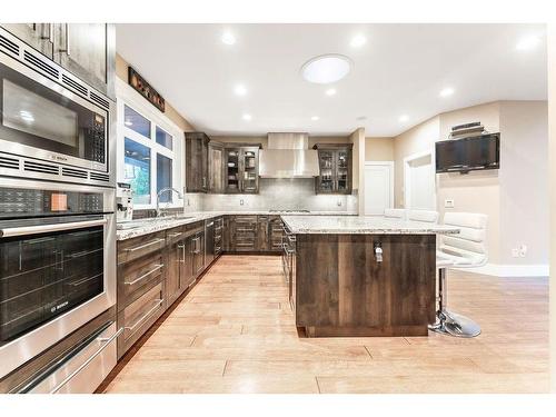 100-8014 338 Avenue East, Rural Foothills County, AB - Indoor Photo Showing Kitchen With Upgraded Kitchen