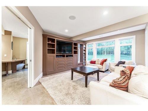 100-8014 338 Avenue East, Rural Foothills County, AB - Indoor Photo Showing Living Room