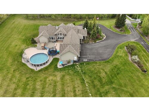 100-8014 338 Avenue East, Rural Foothills County, AB - Outdoor With Above Ground Pool With View