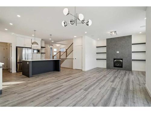 120 Heritage Boulevard, Cochrane, AB - Indoor Photo Showing Kitchen With Upgraded Kitchen