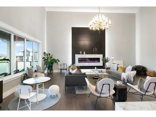 30 Dunes Drive, Desert Blume, AB - Indoor Photo Showing Living Room With Fireplace