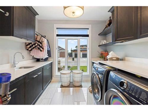 30 Dunes Drive, Desert Blume, AB - Indoor Photo Showing Laundry Room