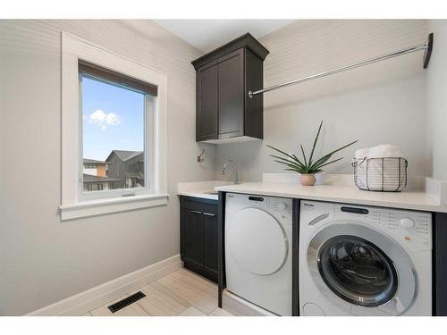 30 Dunes Drive, Desert Blume, AB - Indoor Photo Showing Laundry Room