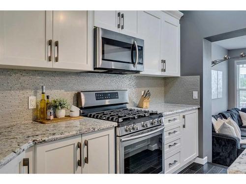 258 Auburn Crest Green Se, Calgary, AB - Indoor Photo Showing Kitchen With Upgraded Kitchen