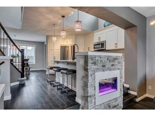 258 Auburn Crest Green Se, Calgary, AB - Indoor With Fireplace