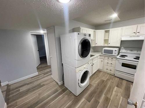 2816 18 Street Sw, Calgary, AB - Indoor Photo Showing Laundry Room