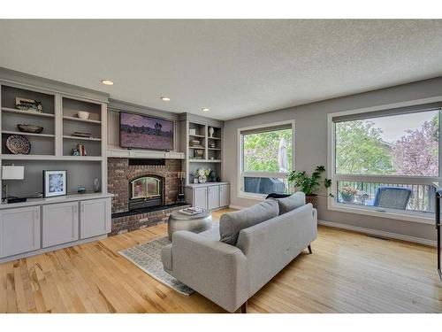 75 Mountain Park Circle Se, Calgary, AB - Indoor Photo Showing Living Room With Fireplace