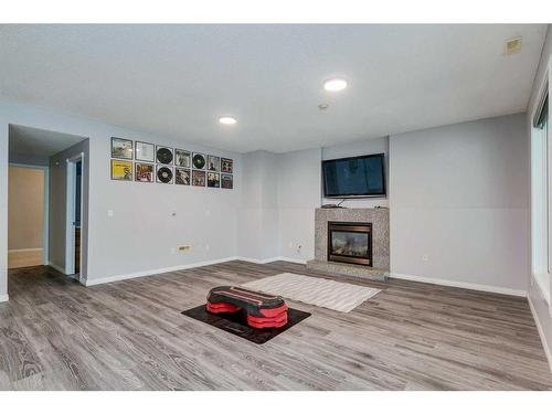 75 Mountain Park Circle Se, Calgary, AB - Indoor With Fireplace