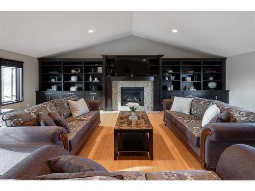 84 Gray Way, Rural Rocky View County, AB - Indoor Photo Showing Living Room With Fireplace