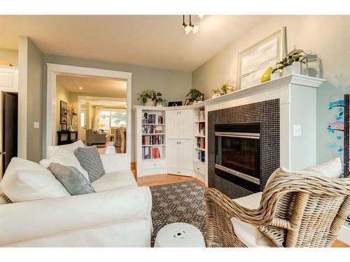 1731 8 Avenue Nw, Calgary, AB - Indoor Photo Showing Living Room With Fireplace