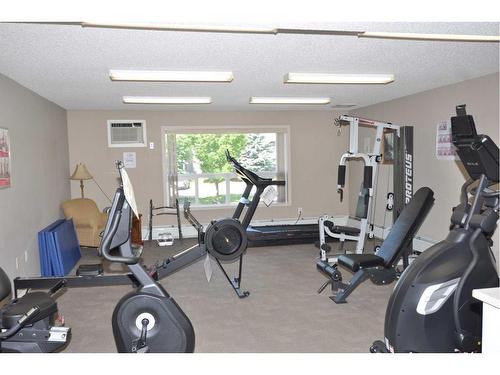 3412-3000 Millrise Point Sw, Calgary, AB - Indoor Photo Showing Gym Room