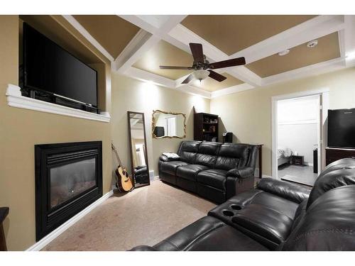 116 Pinnacle Place, Fort Mcmurray, AB - Indoor Photo Showing Living Room With Fireplace