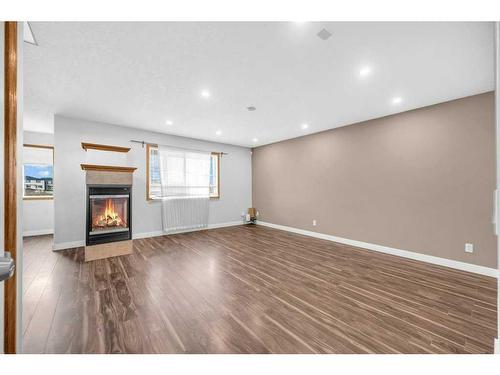 104 Taracove Crescent Ne, Calgary, AB - Indoor With Fireplace