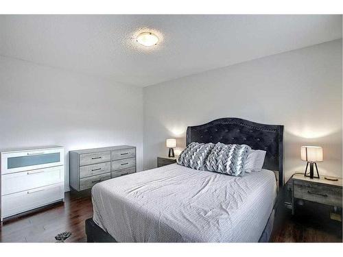 4 Panatella Street Nw, Calgary, AB - Indoor Photo Showing Bedroom