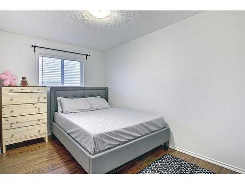 4 Panatella Street Nw, Calgary, AB - Indoor Photo Showing Bedroom
