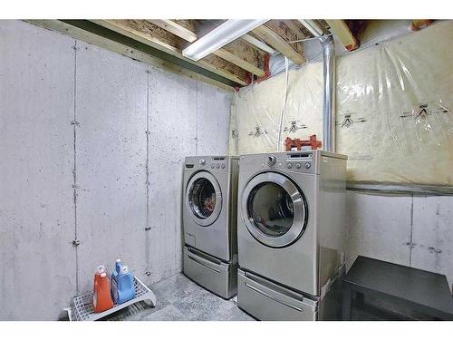 4 Panatella Street Nw, Calgary, AB - Indoor Photo Showing Laundry Room