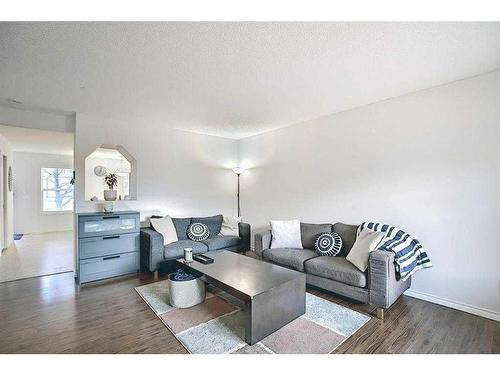 4 Panatella Street Nw, Calgary, AB - Indoor Photo Showing Living Room