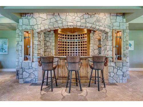 290226 316 Street West, Rural Foothills County, AB - Indoor Photo Showing Dining Room With Fireplace