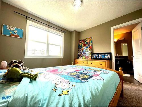 29 Panatella Road Nw, Calgary, AB - Indoor Photo Showing Bedroom