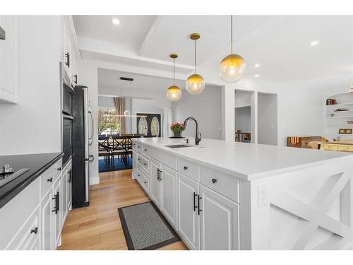85 Royal Highland Road Nw, Calgary, AB - Indoor Photo Showing Kitchen With Upgraded Kitchen
