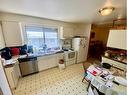 2 Butte Place Nw, Calgary, AB  - Indoor Photo Showing Kitchen 