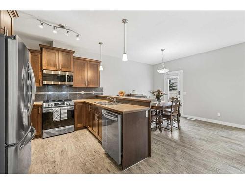 410 Ranch Ridge Meadow, Strathmore, AB - Indoor Photo Showing Kitchen With Double Sink